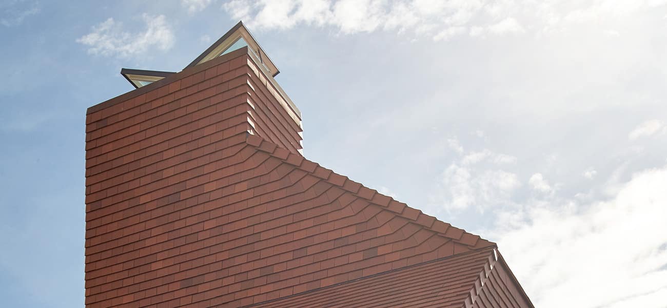 An image of a cloak verge which meets BS 5534 requirements and NHBC guidelines, available from roofing systems specialists, Marley.