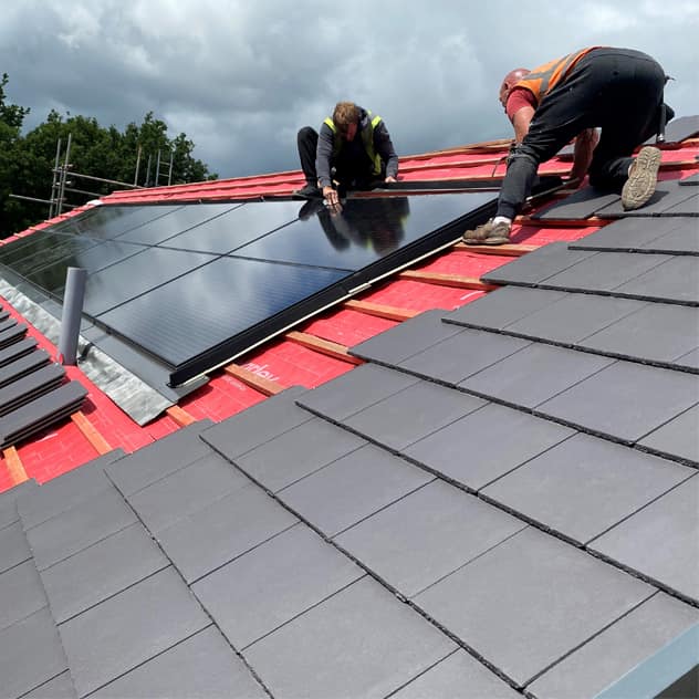 roofers installing solar panels