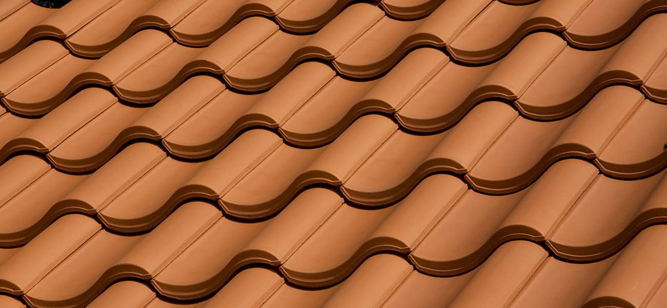 Marley clay single interlocking pantile natural red used on a low pitch roof