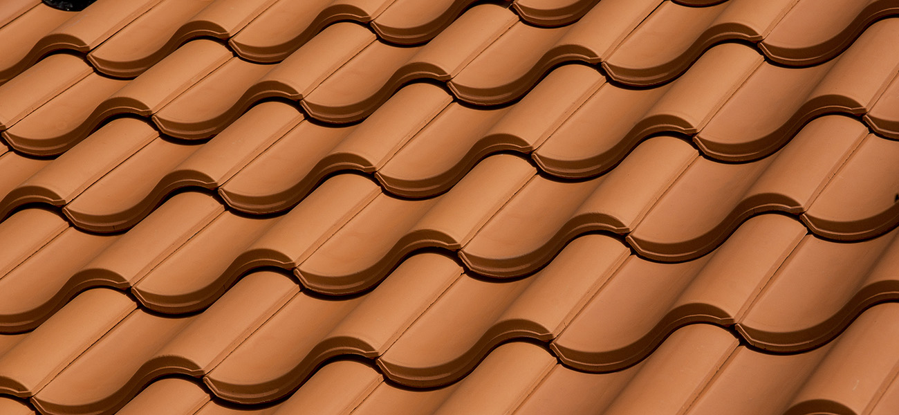 Single interlocking pantile natural red used on a low pitch roof