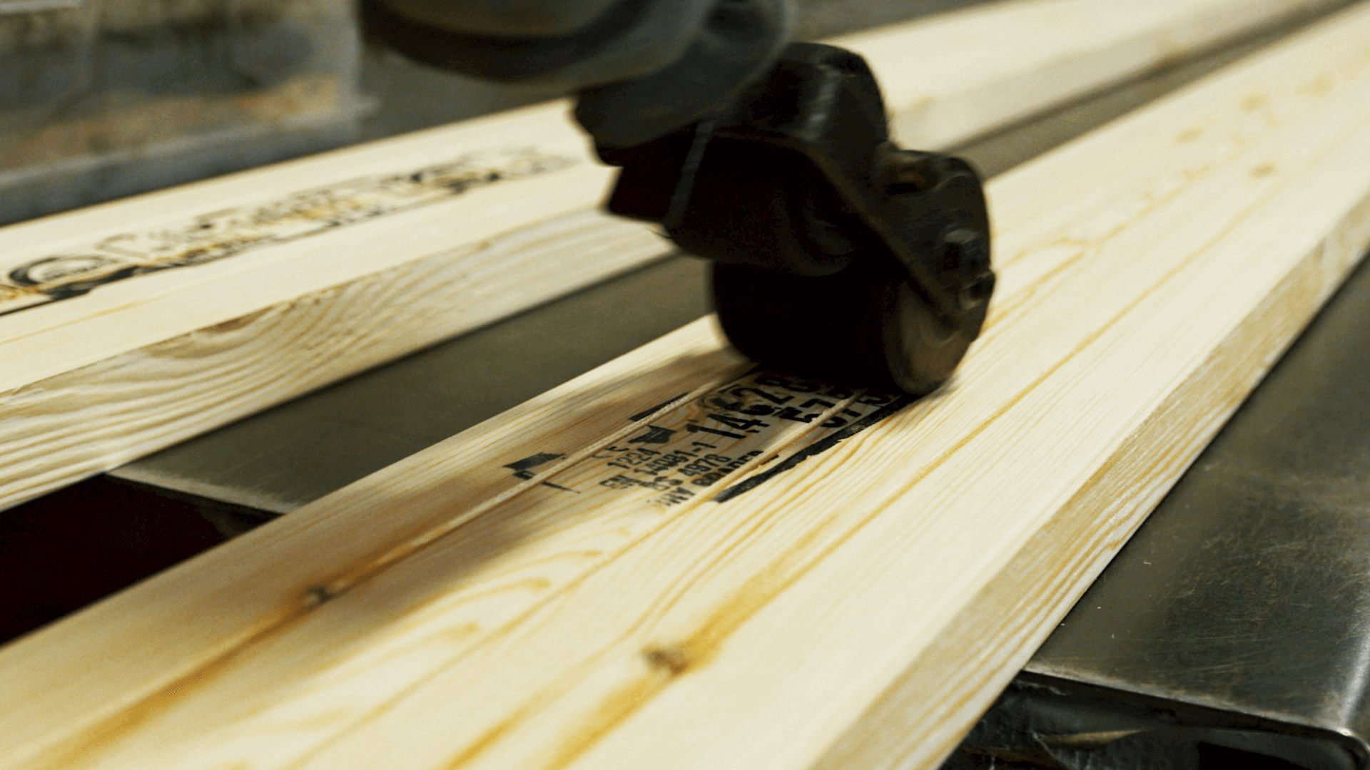 The back of a Marley Timber Decking board being stamped