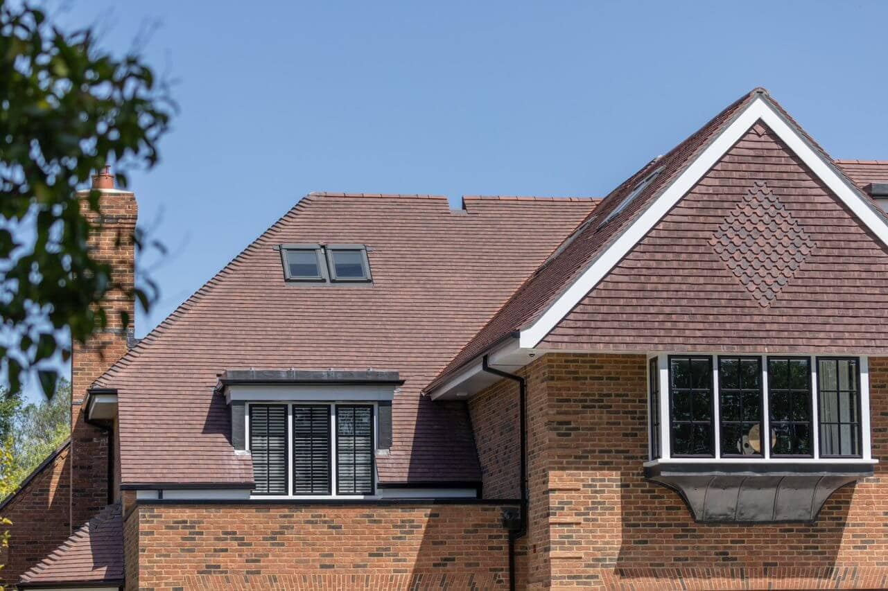 Close up on a residential house featuring Marley’s Acme Double Camber clay plain tile