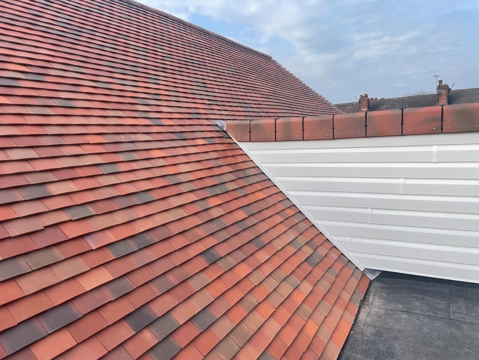 Extreme close up of Stokeminster School using Marley Acme Double Camber roof tiles
