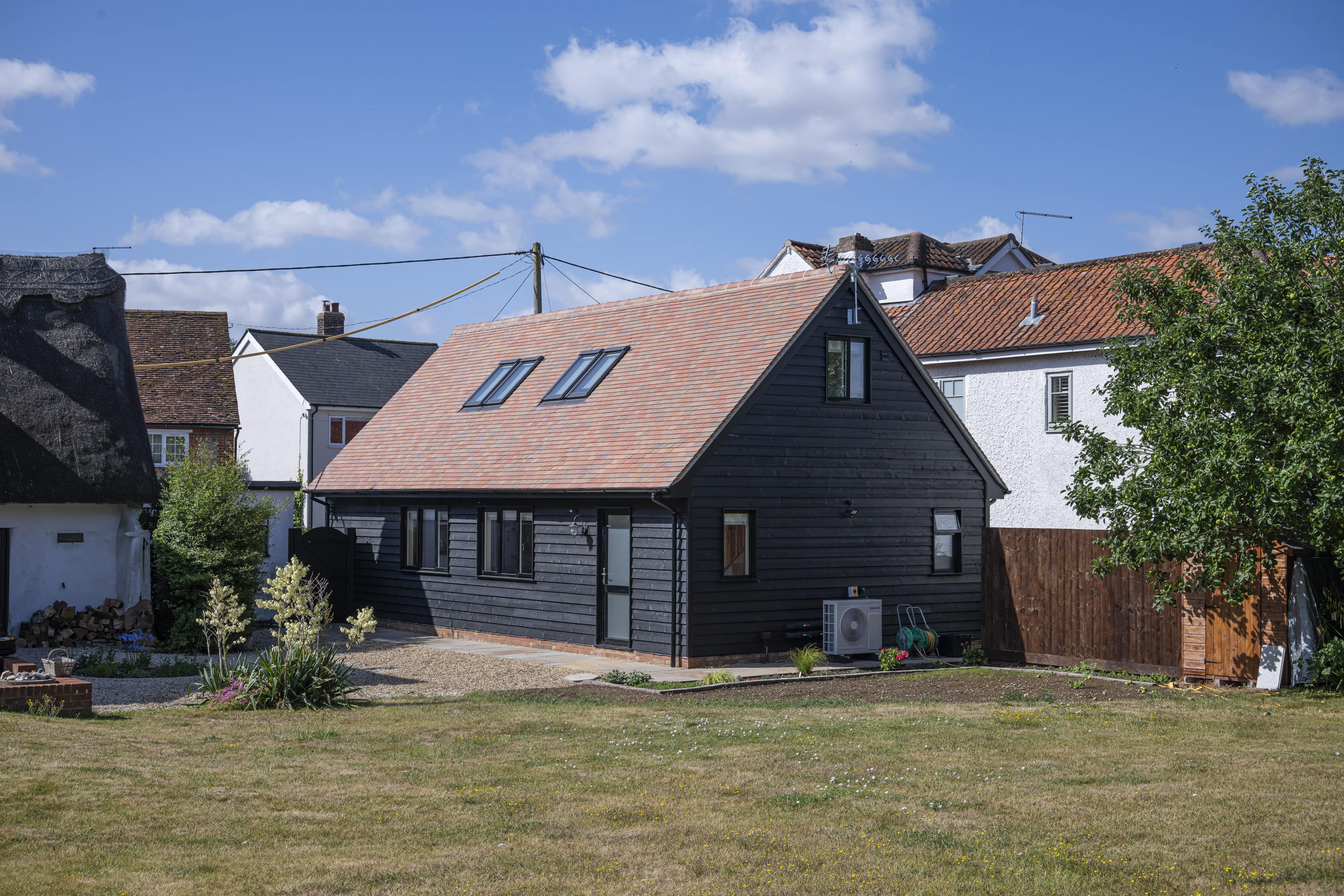 Long shot of marley clay tiles in autumn brindle