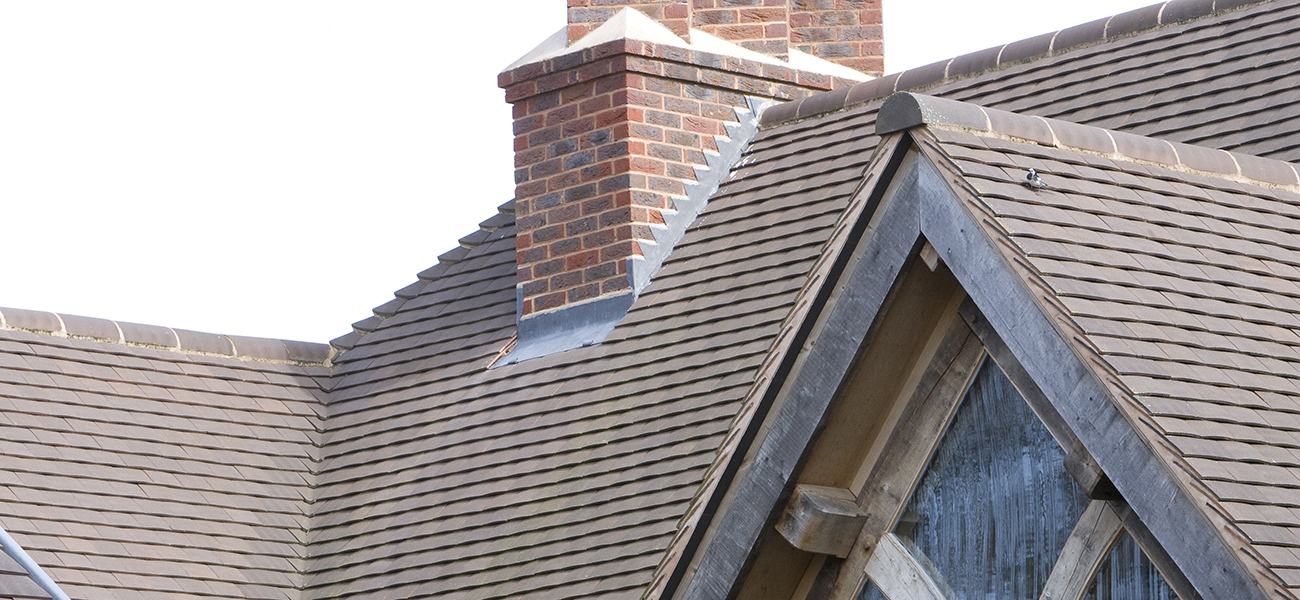 Roof detail showing valley and ridge with Acme Double Camber used