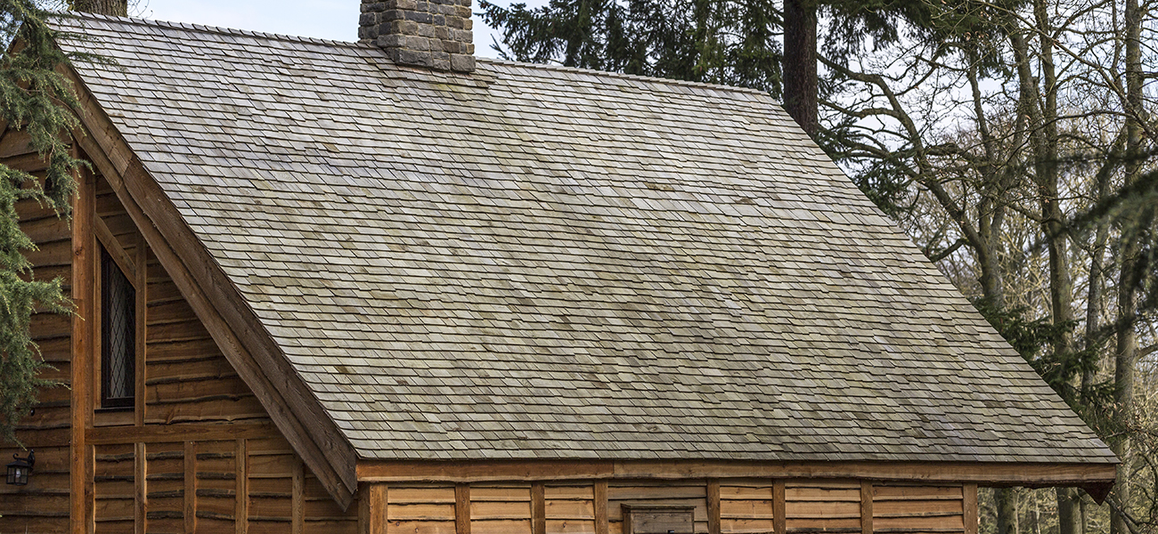 Roof of Warwick castle lodge using  cedar shingles from Marley Ltd 