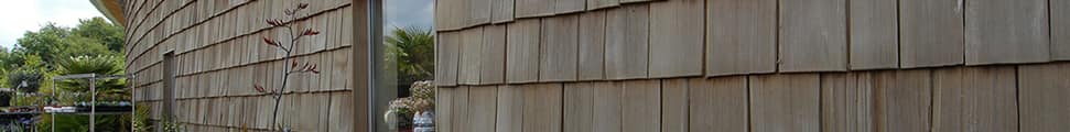 Cedar shakes displayed vertically on housing project