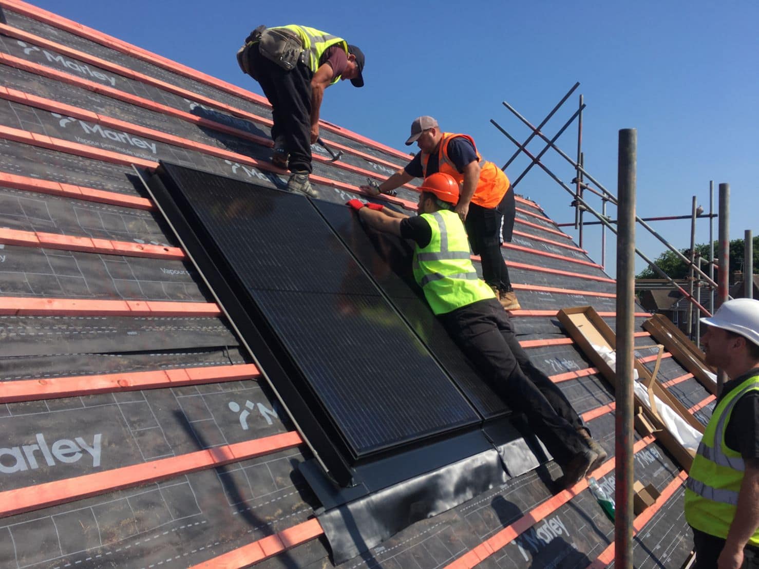 Marley solar panels being installed on residential project with Doncaster Council