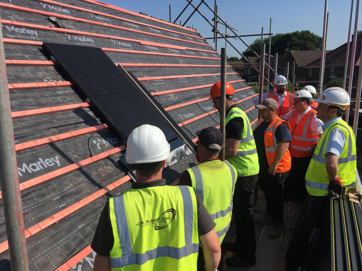 Marley solar panels being installed on residential project with Doncaster Council