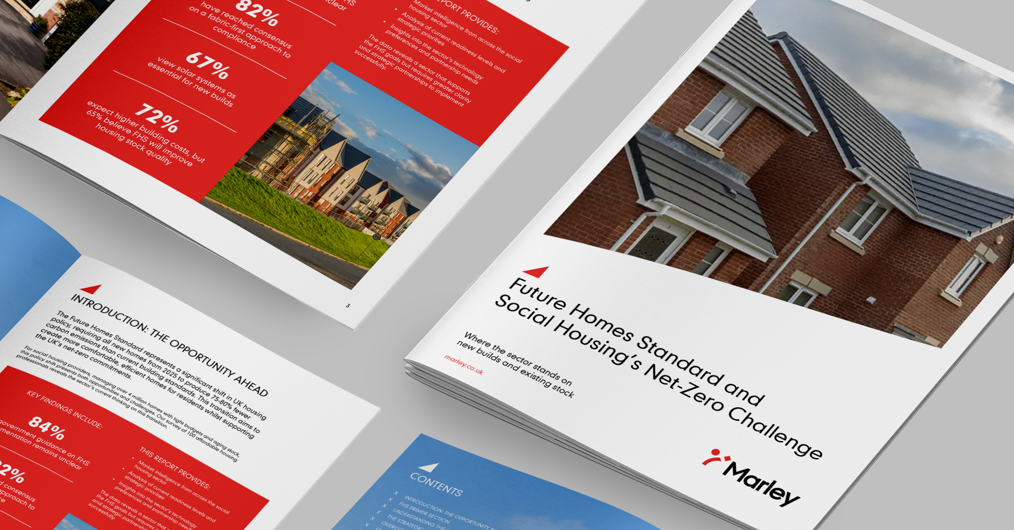 Image showcasing a number of copies of a whitepaper titled "Future Homes Standard and Social Housing’s Net-Zero Challenge"